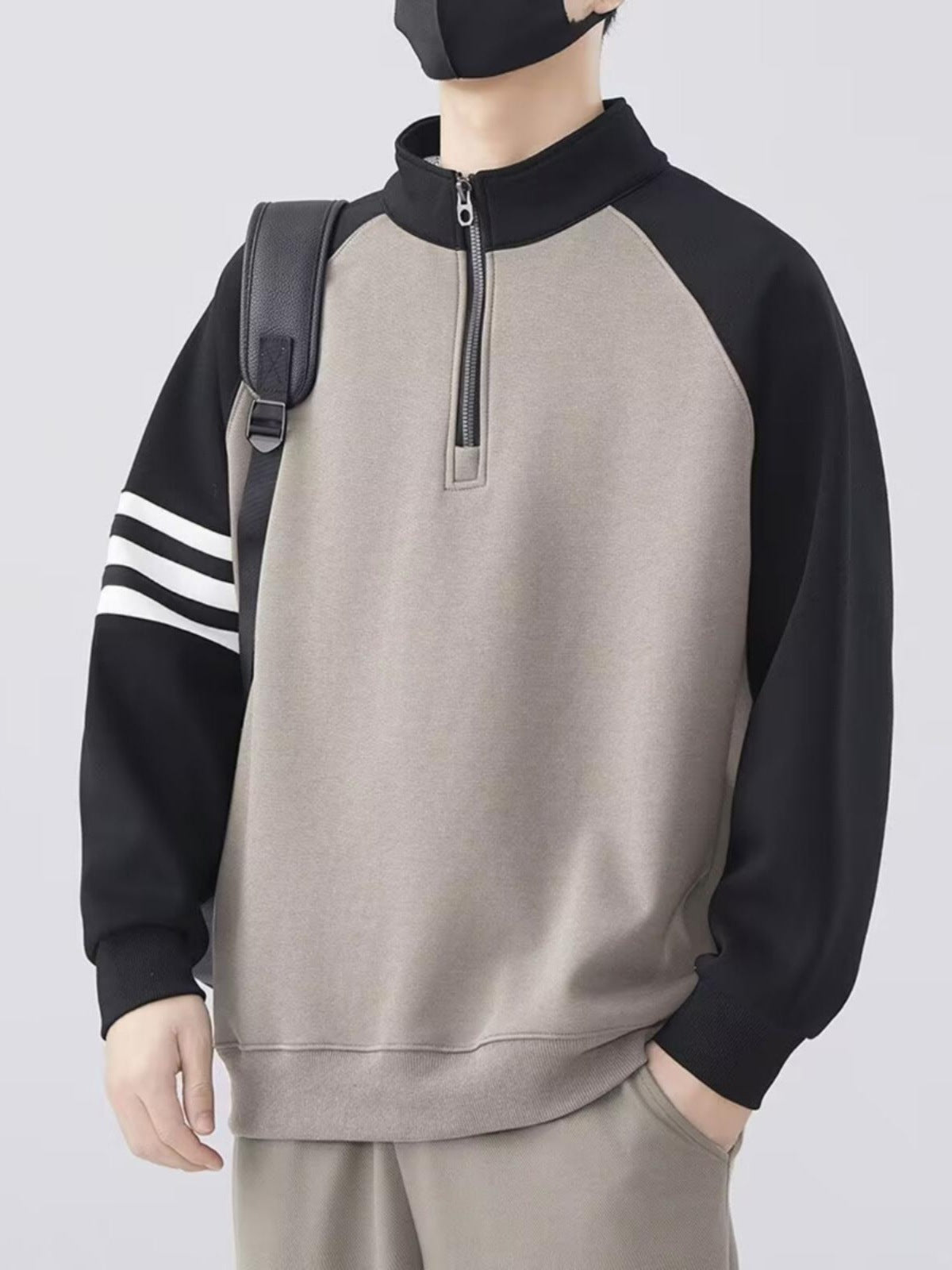 Half-zipper stand collar sweater exclusively for men.