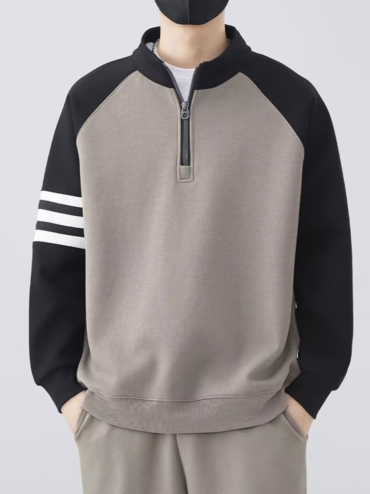 Half-zipper stand collar sweater exclusively for men.